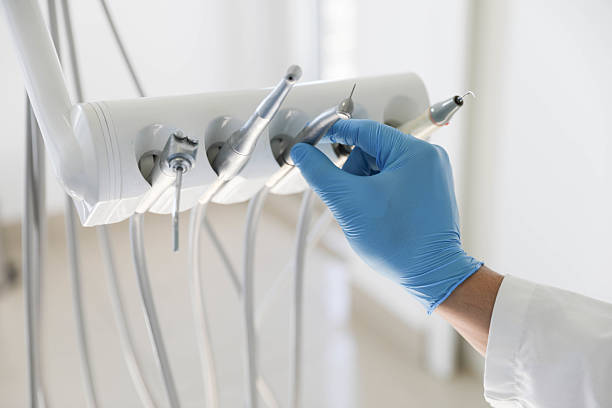 Professional Root Canal Treatment technician working in Huntsville, TX